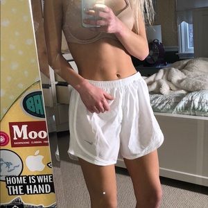 white nike running shorts